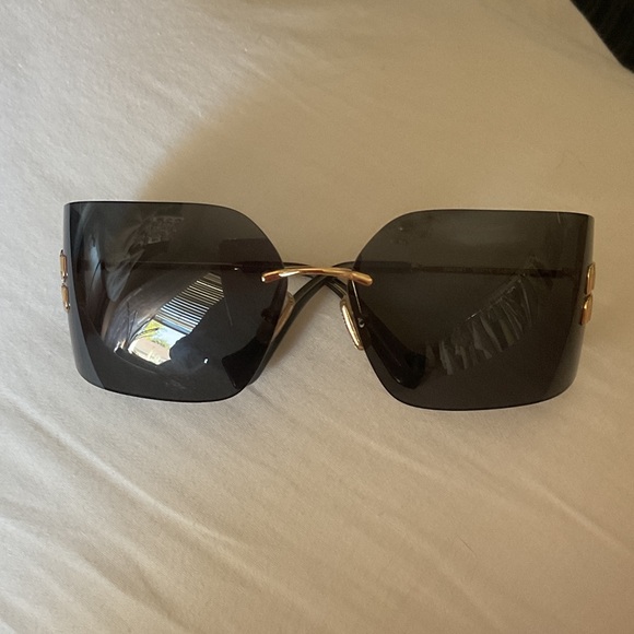 Miu Miu Black and Gold Sunglasses - Picture 4 of 8